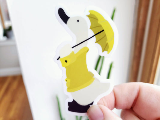 Duck in a Yellow Rain Coat with Umbrella Vinyl Sticker - Front Shot