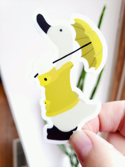 Duck in a Yellow Rain Coat with Umbrella Vinyl Sticker - Portrait Front Shot