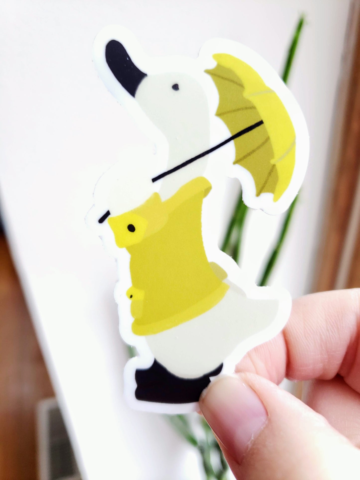 Duck in a Yellow Rain Coat with Umbrella Vinyl Sticker - Portrait Front Shot