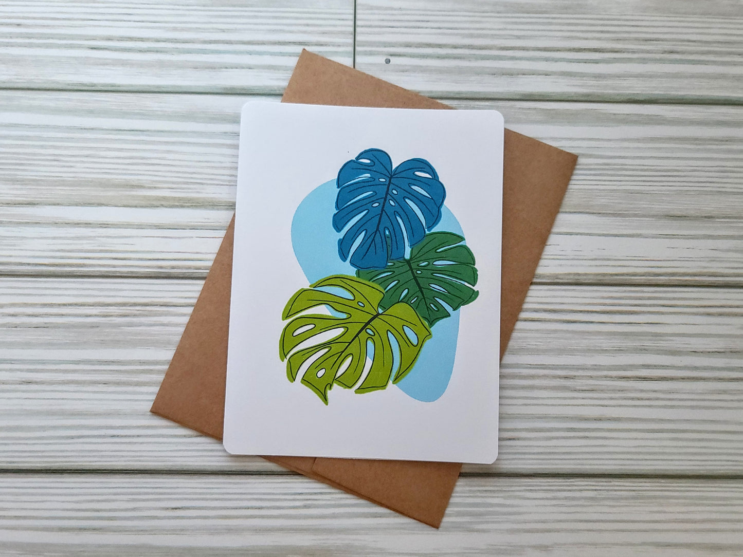 Monstera Leaves Handmade Greeting Card - Recycled Paper and Kraft Envelope - Landscape Overhead Shot