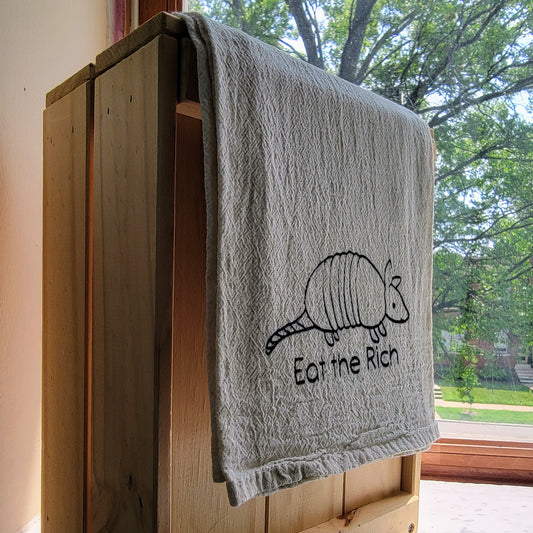 Eat the Rich Armadillo Screen Printed Tea Towel - Hanging Shot