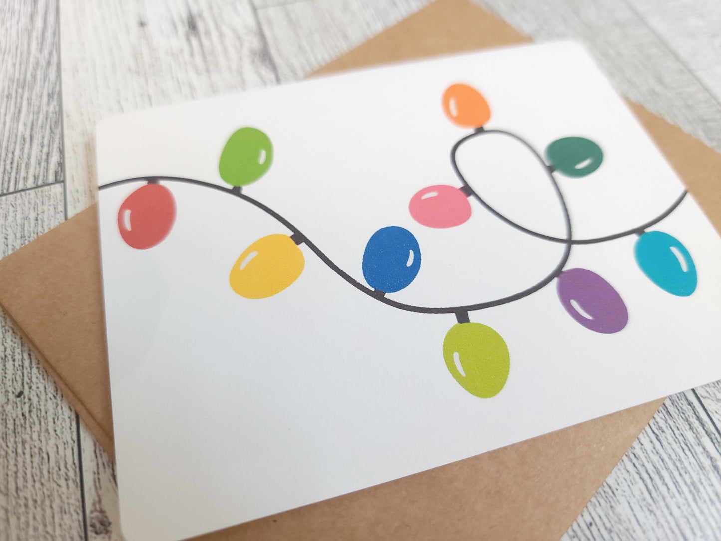 String of Lights Handmade Greeting Card - Recycled Paper and Kraft Envelop - Angled Shot