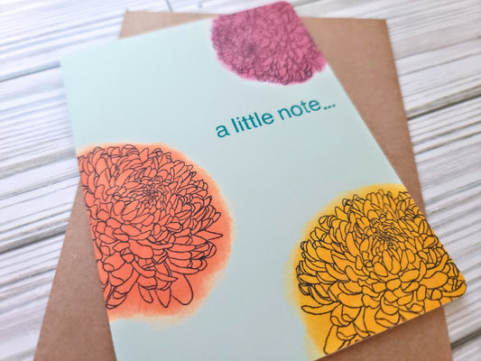 A Little Note with Flowers Handmade Greeting Card - Recycled Paper and Kraft Envelop - Angled Overhead Shot