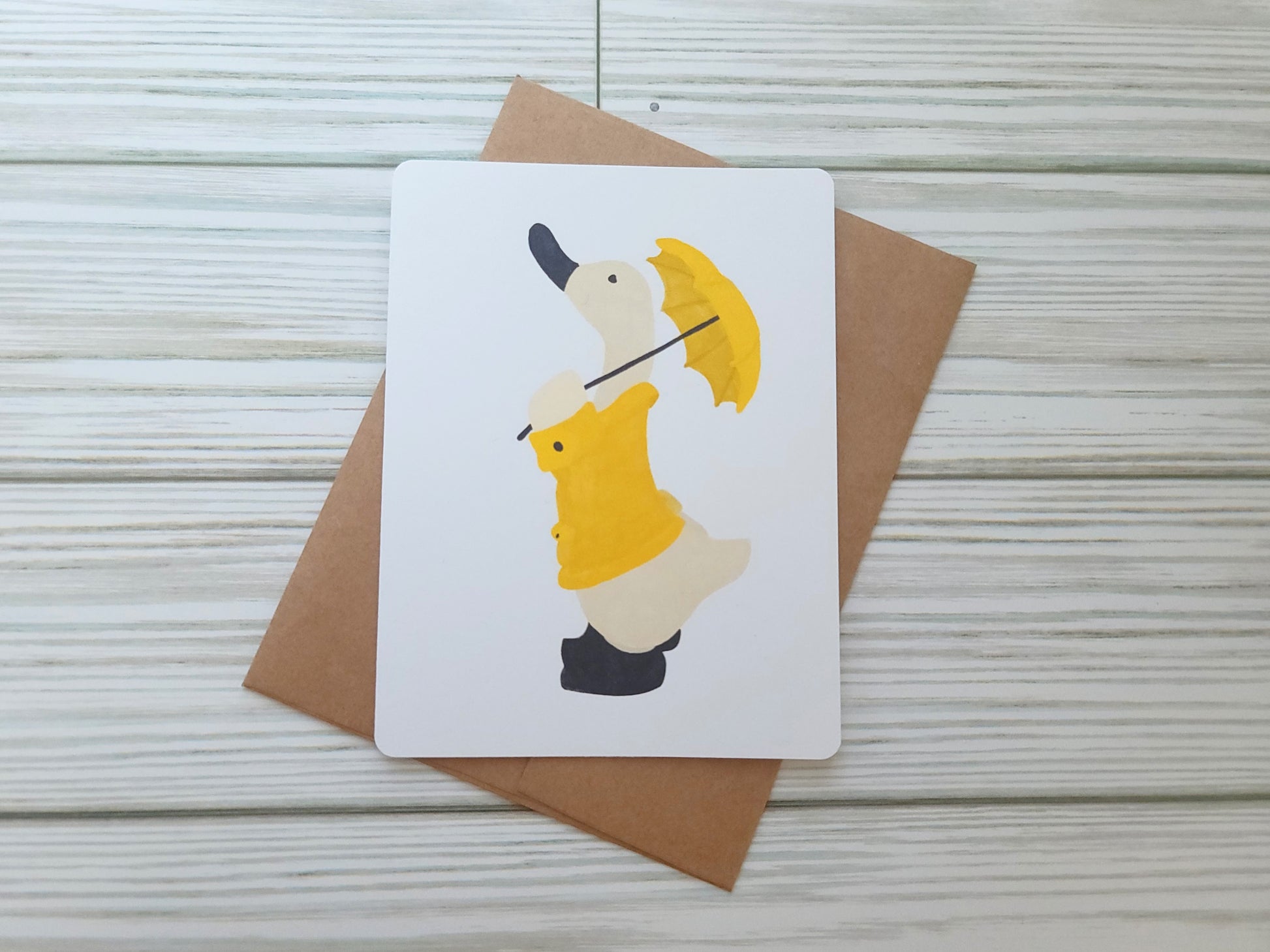 Duck in a Yellow Rainjacket with Umbrella Handmade Greeting Card - Recycled Paper and Kraft Envelope - Landscape Overhead Shot