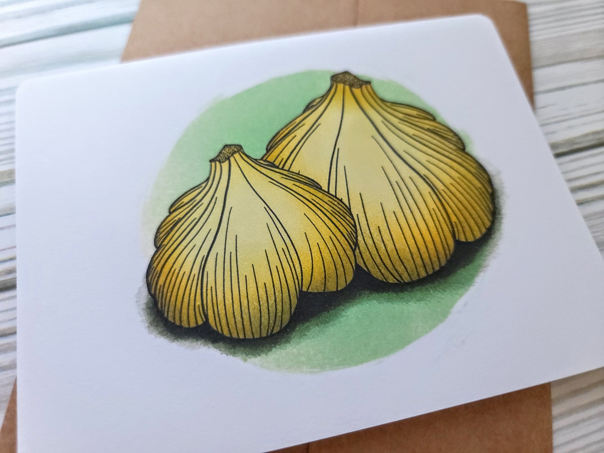 Garlic Handmade Greeting Card - Recycled Paper and Kraft Envelope - Angled Overhead Shot