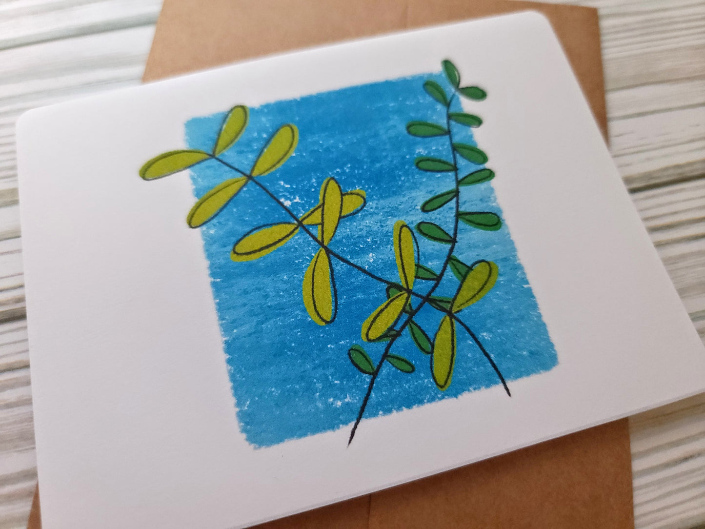 Plant Handmade Greeting Card - Recycled Paper and Kraft Paper - Angled Overhead Shot