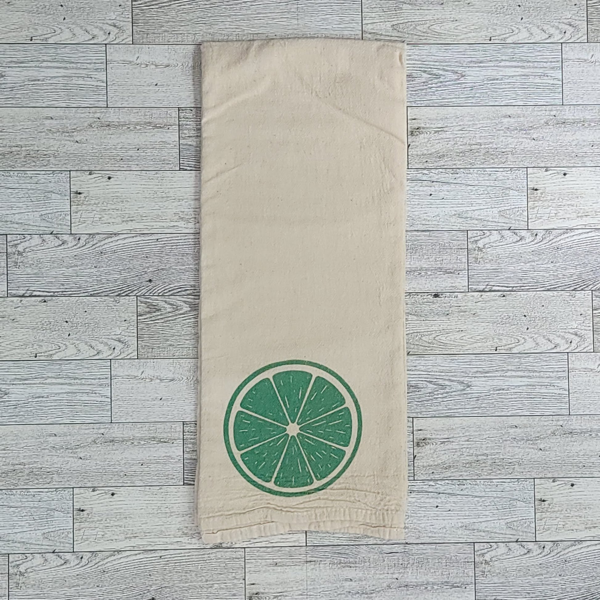 Green Citrus Slice Screen Printed Tea Towel - Folded Shot
