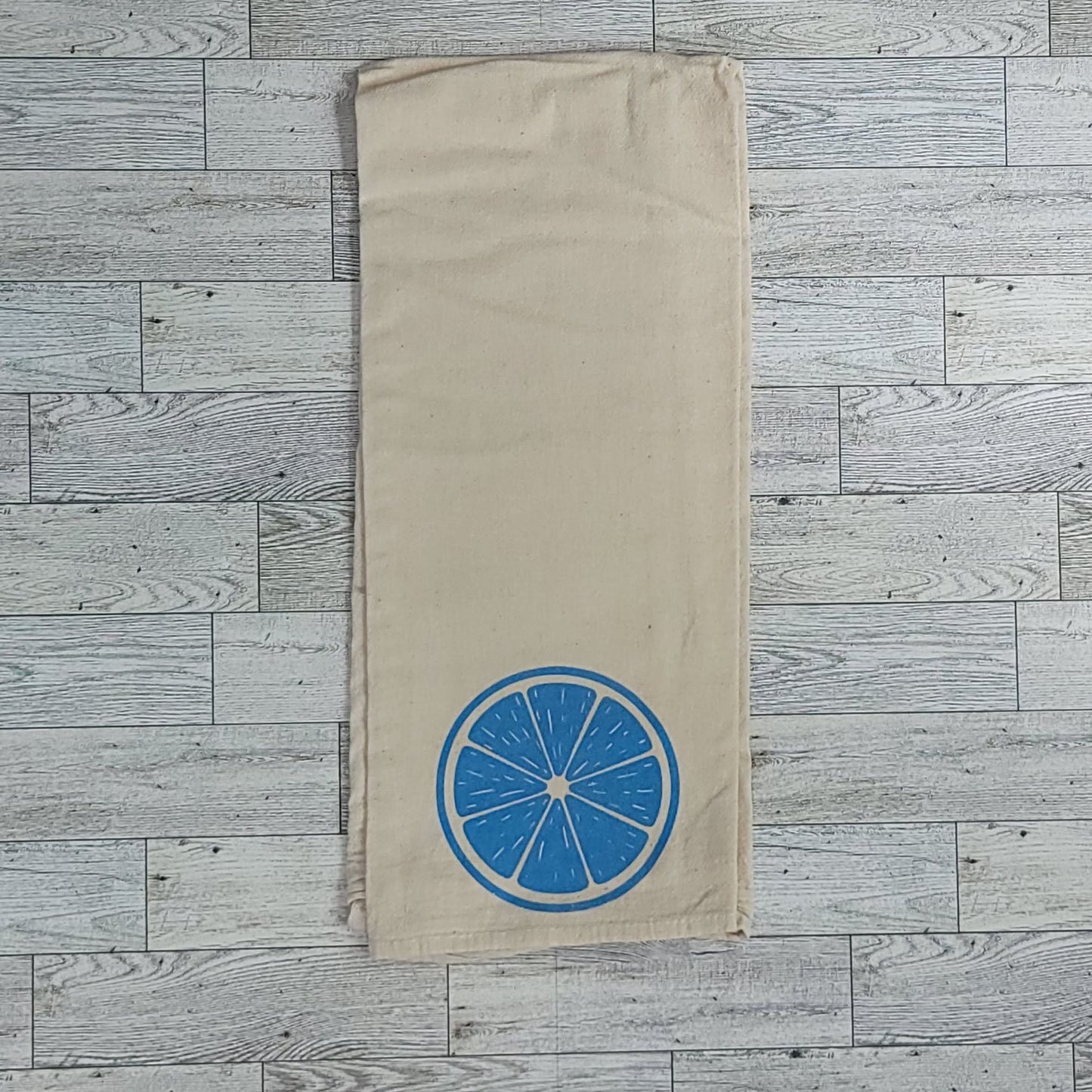 Blue Citrus Slice Screen Printed Tea Towel - Folded Shot