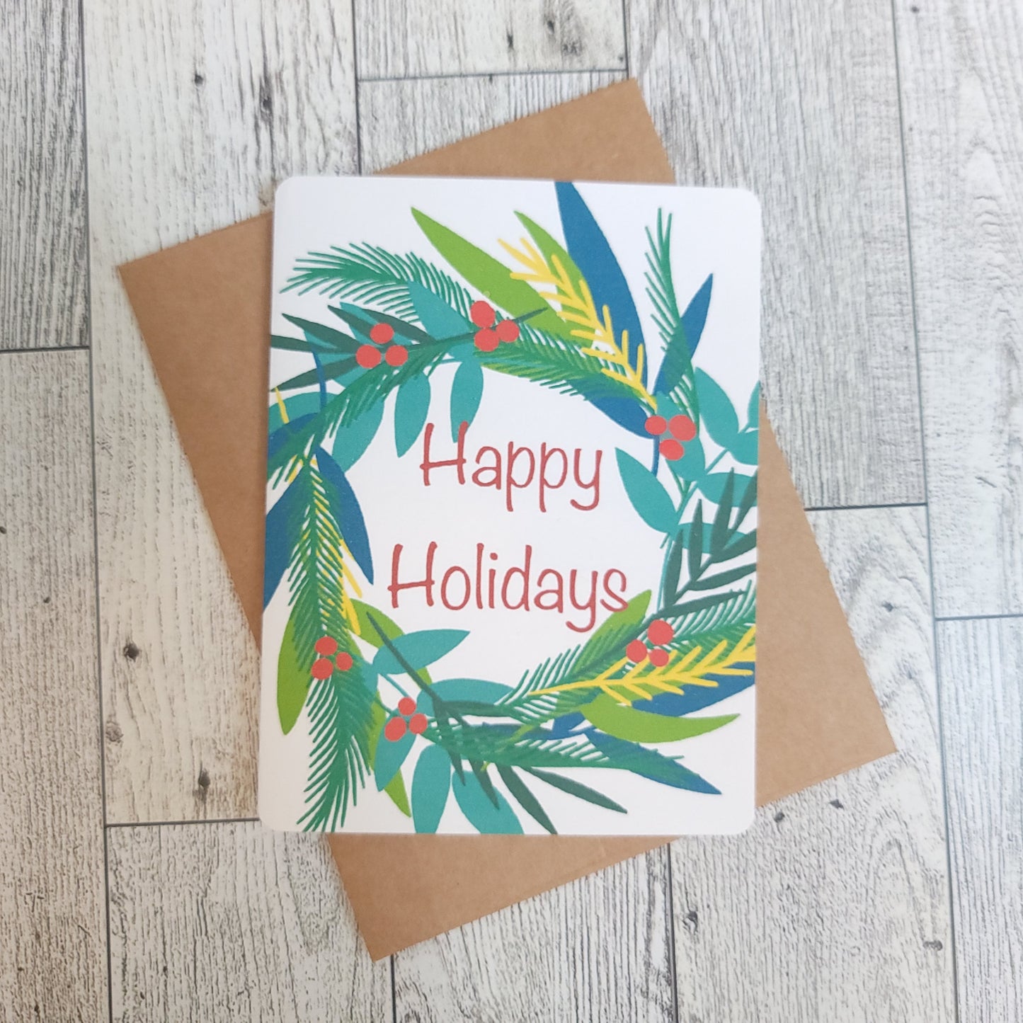 Happy Holidays Wreath Handmade Greeting Card - Recycled Paper and Kraft Envelop - Overhead Shot